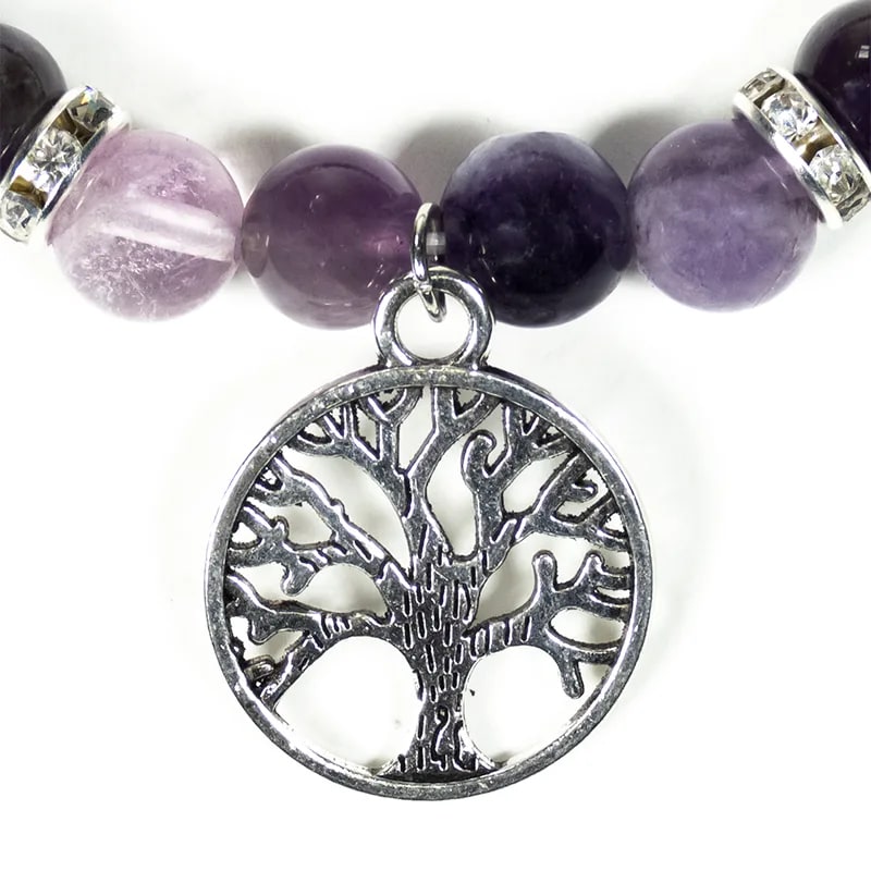 Elastische edelsteen armband van fluoriet en amethist met boom des levens