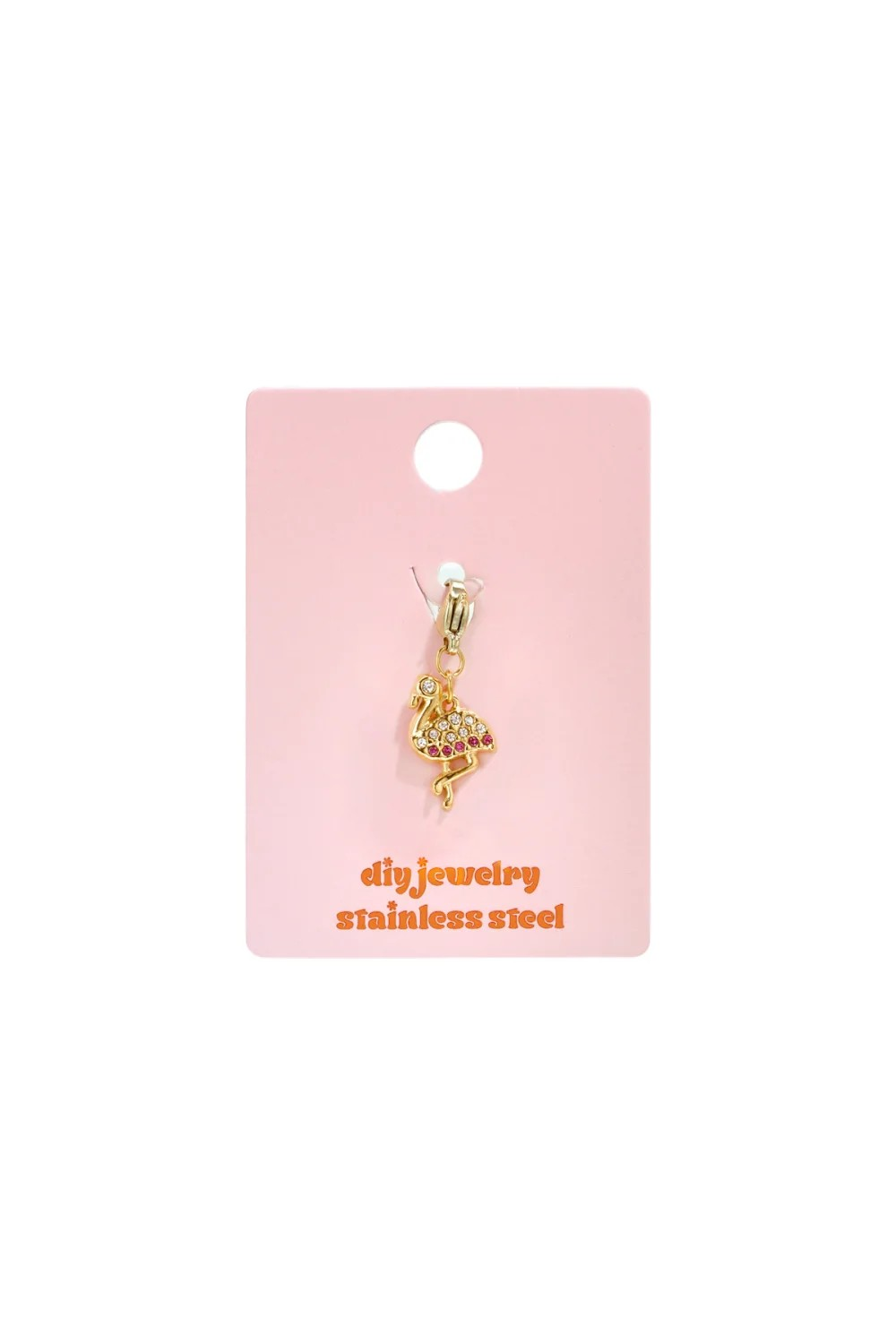 Glow Mystic in Style flamingo bedel gepresenteerd op een roze diy jewelry stainless steel kaartje