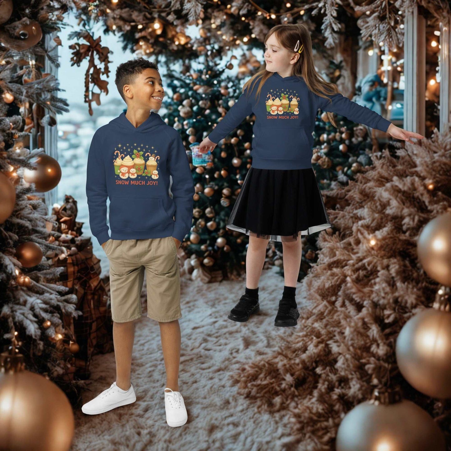 Kids wearing festive Kids Christmas Hoodie with holiday design in winter setting