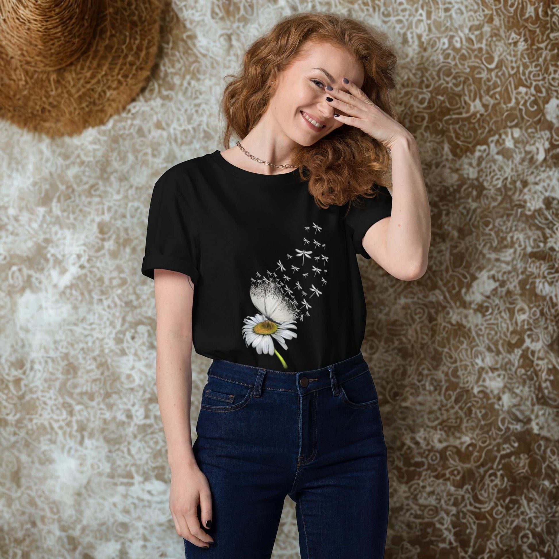 woman wearing Bloom & Fly Mystic Daisy Organic Cotton Tee with daisy and birds design