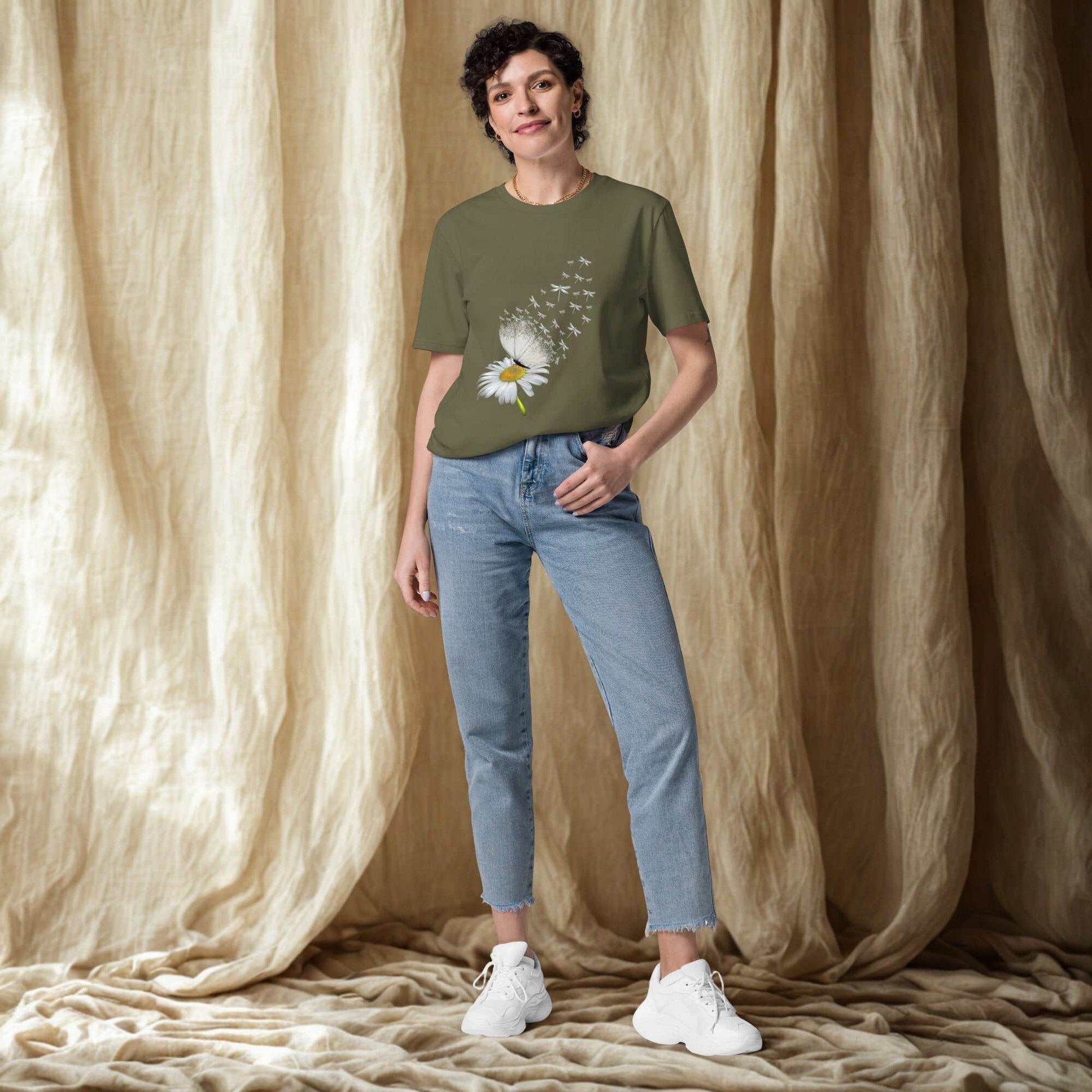 woman wearing Bloom & Fly Mystic Daisy Organic Cotton Tee with daisy design and blue jeans