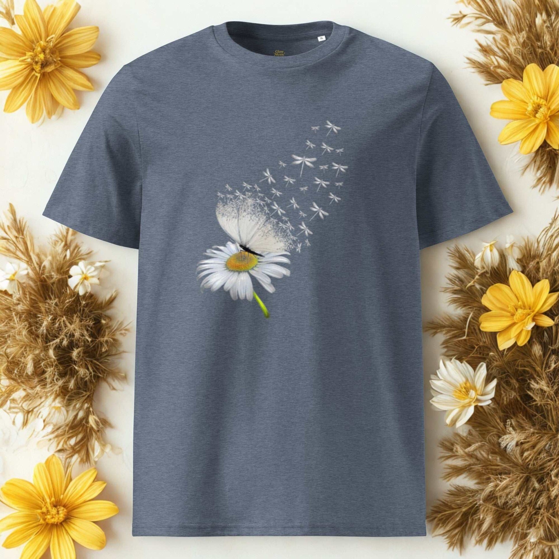 Bloom & Fly Mystic Daisy Organic Cotton Tee with a daisy and dragonfly design on a blue eco-friendly fabric