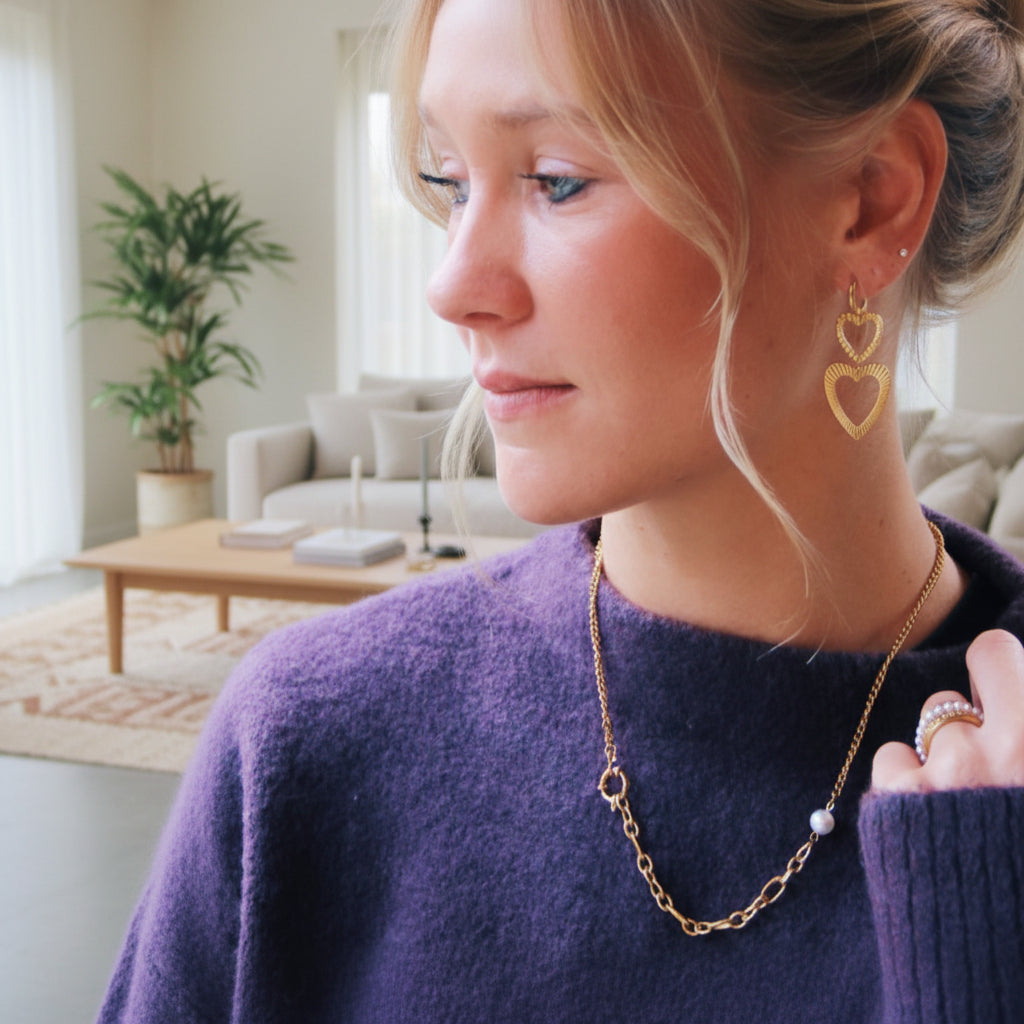 Trendy goudkleurige dubbele hart oorbellen van roestvrij staal, 5 cm