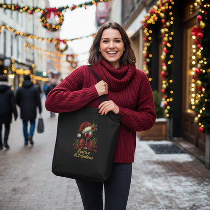 Eco Tote Bag with festive "Festive & Fabulous" design, worn by woman outdoors in winter setting