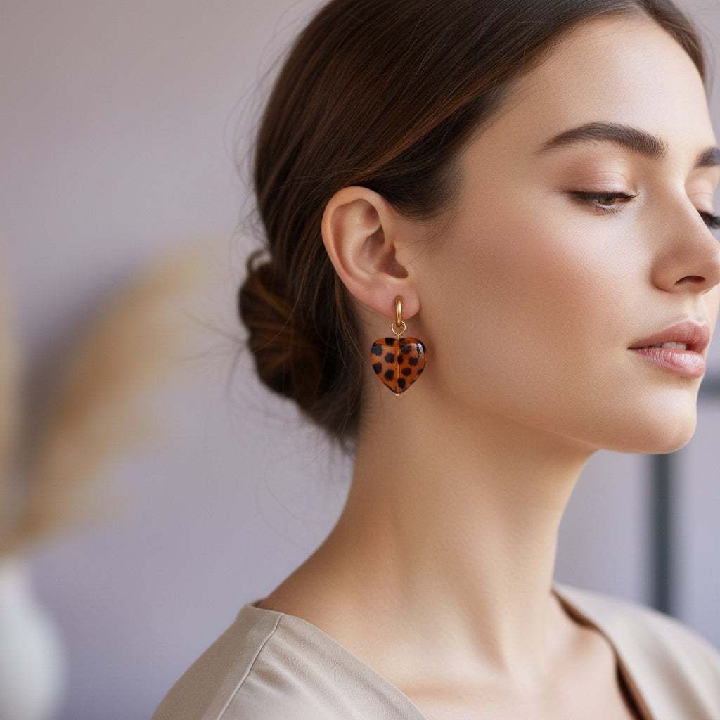 Statement oorbellen panterprint hart met gouden oorring