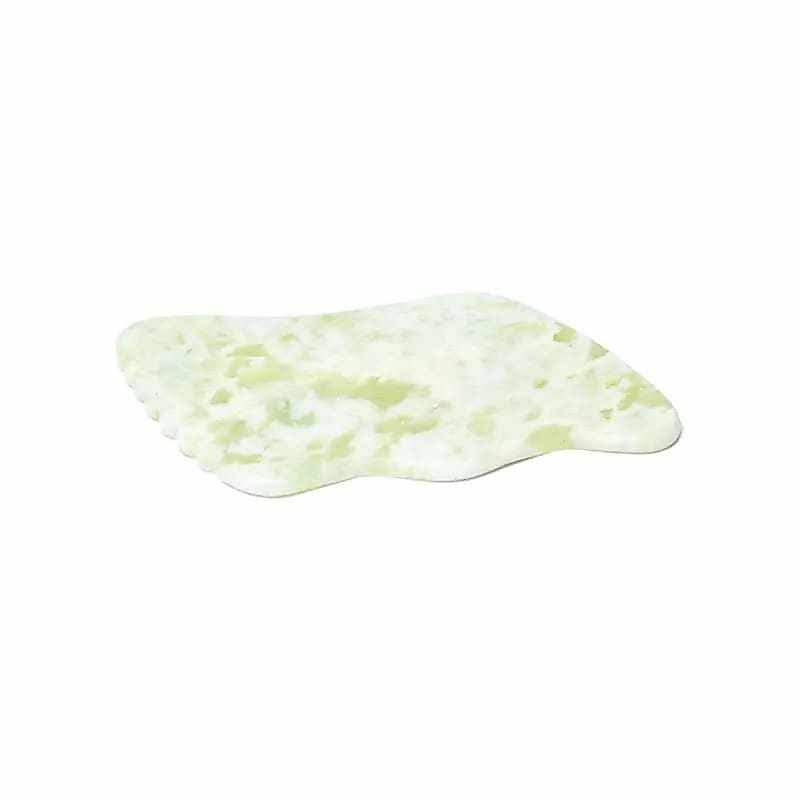 White jade guasha massage stone for relaxation and self-care in Wellness Box Rituals of Relaxation Angel