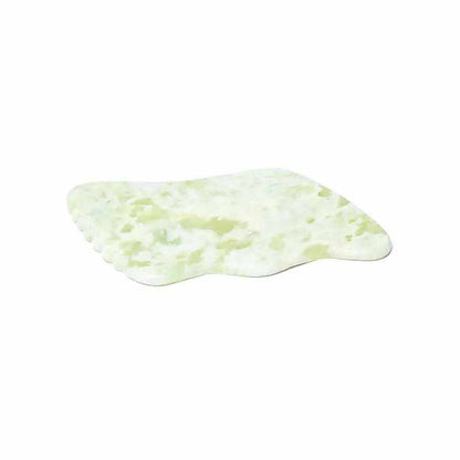White jade guasha massage stone for relaxation and self-care in Wellness Box Rituals of Relaxation Angel