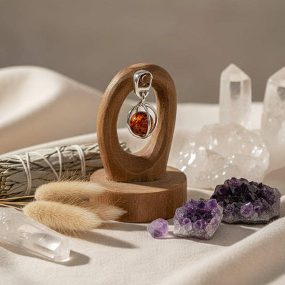 925 sterling zilveren ketting met warme amber hanger en zwarte lederen ketting