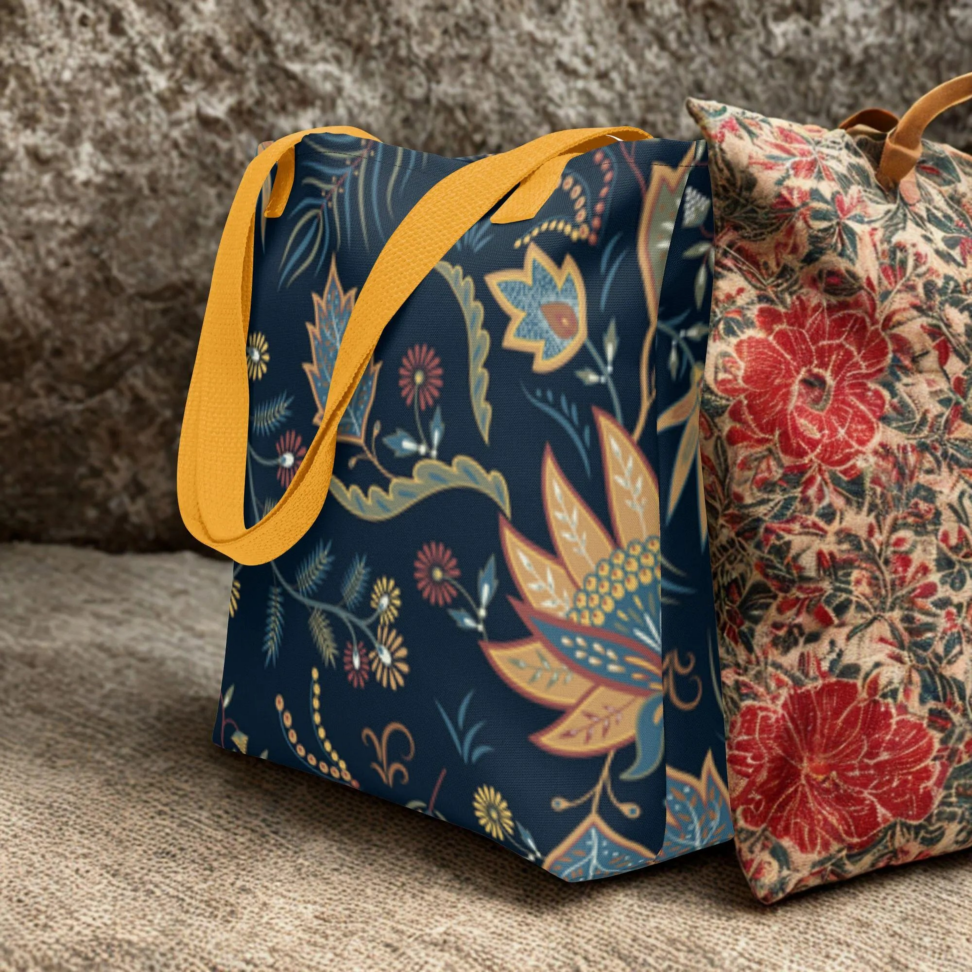 Autumn Floral Tote Bag with navy background, warm floral design, and yellow handles, eco-friendly and spacious for daily use.