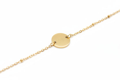 Regenboogbaby armband van stainless steel met gegraveerde regenboog en hartje