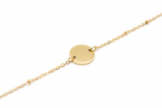 Regenboogbaby armband van stainless steel met gegraveerde regenboog en hartje