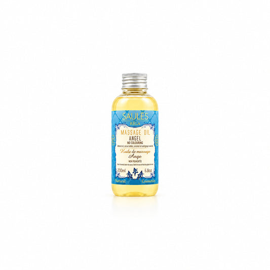 Saules Fabrika luxe massageolie Angel 200ml doseerfles met lichtblauw label tegen een sfeervolle achtergrond met droogbloemen en pampasgras - Glow Mystic in Style.