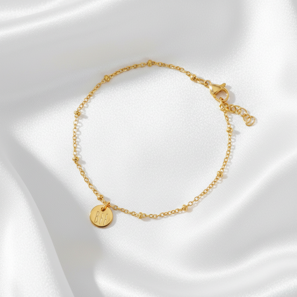 BFF armband goudkleurig stainless steel op lichte satijnen stof