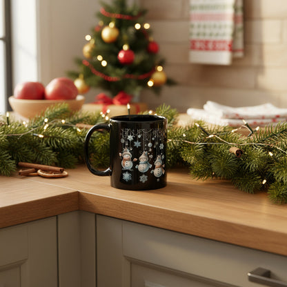Black glossy 11oz mug with elegant snowman trio and hanging snowflakes design for Christmas warmth