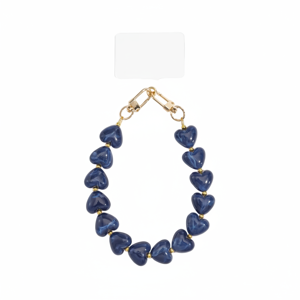 Glow Mystic in Style blauwe hartjes telefoonketting vastgemaakt aan smartphone hoesje