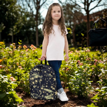 Young girl standing outdoors holding Shining Star Backpack Cosmic School Bag with starry cosmic design