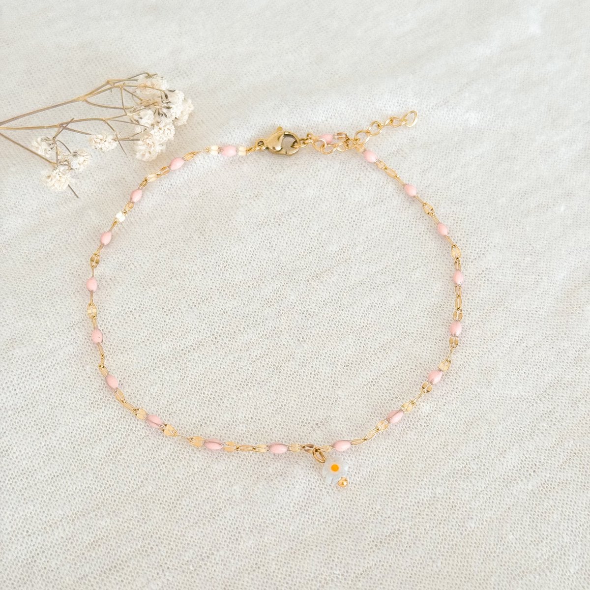 Roze emaille madelief enkelbandje goudkleur van stainless steel