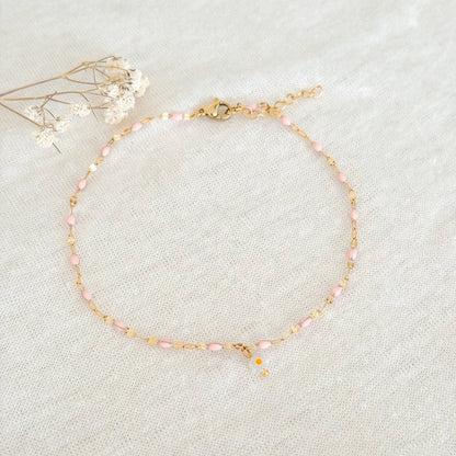 Roze emaille madelief enkelbandje goudkleur van stainless steel