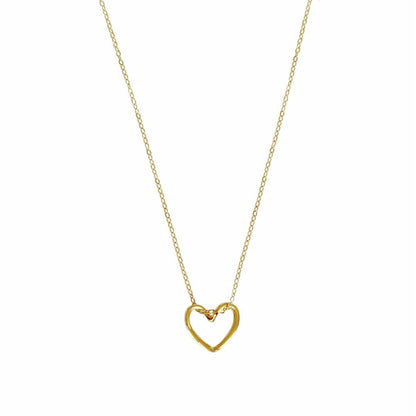 Gouden hart ketting met zwevend effect close-up”