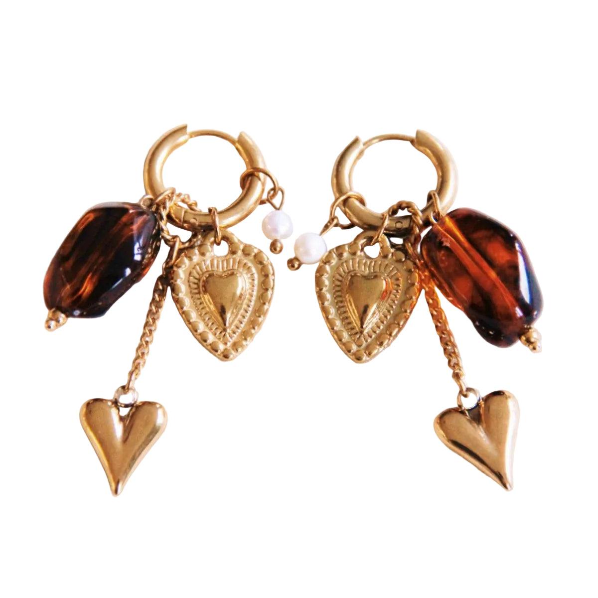 Goudkleurige oorbellen met hart en amber nugget hangers van roestvrij staal, luxueus en lichtgewicht statement hoops.
