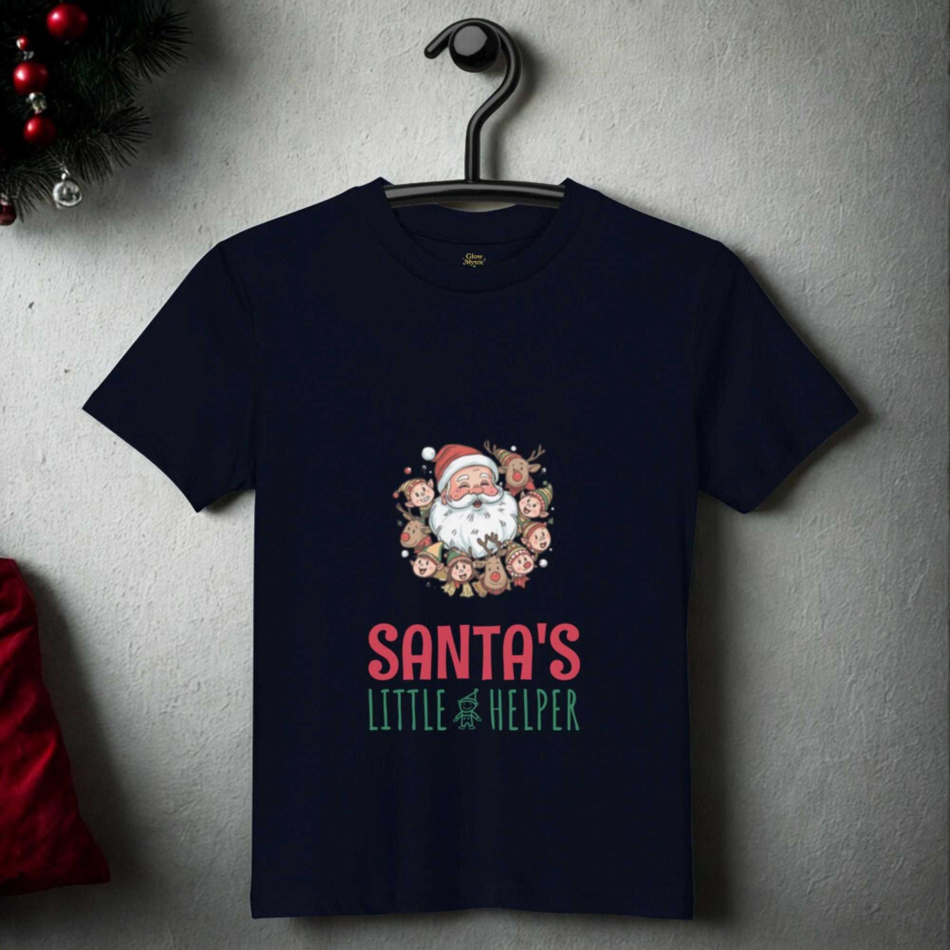 Santa's Little Helper Christmas T-Shirt with festive Santa and elves design on navy cotton fabric hanging on a hook