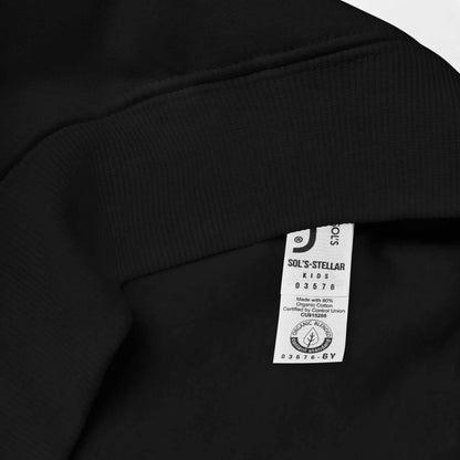 Close-up of black Kids Christmas Hoodie showing organic cotton fabric and care label