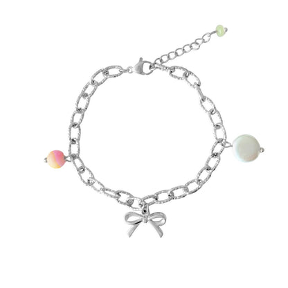 Zomerse statement armband met strikje en Perzische jade hanger”