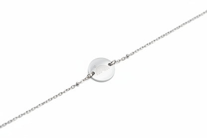 Regenboogbaby armband van stainless steel met gegraveerde regenboog en hartje