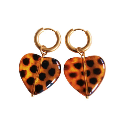 Goudkleurige RVS oorbellen met panterprint hart hanger