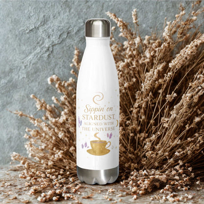 Sleek white Sippin on Stardust Water Bottle with gold and lavender cosmic design, stainless steel, insulated for hot and cold drinks, eco-friendly and leak-proof.
