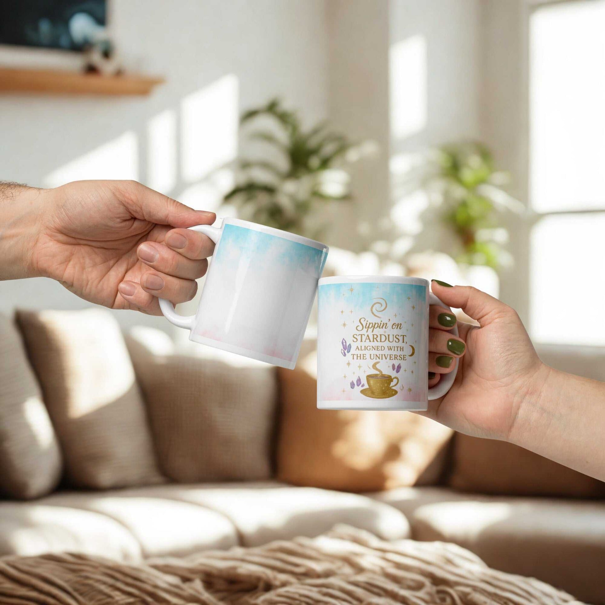 Two hands clinking Sippin on Stardust Coffee Mugs with celestial design in cozy living room setting