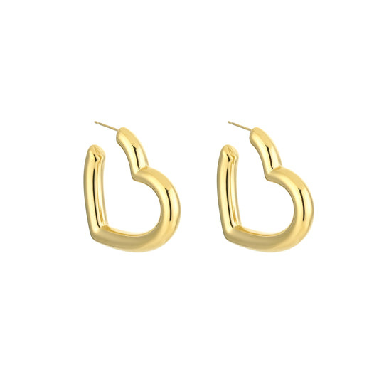 Glow Mystic in Style goudkleurige hart vormige love hoops op witte achtergrond