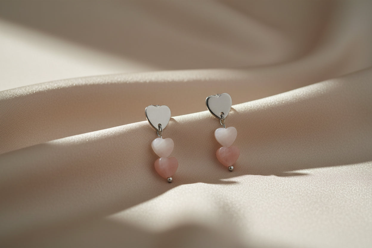 Roze opaal hartjes oorbellen van stainless steel