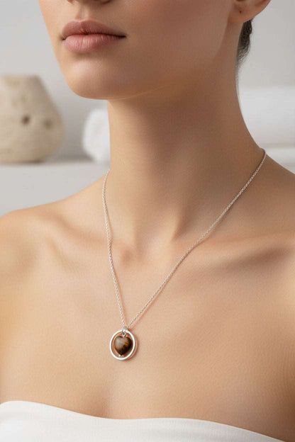 Ketting Tijgeroog Hartje ring van zilver met stainless steel band en warm tijgeroog hartje