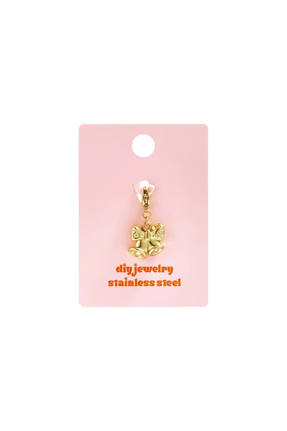 Glow Mystic in Style kerstbellen bedel gepresenteerd op een roze diy jewelry stainless steel kaartje