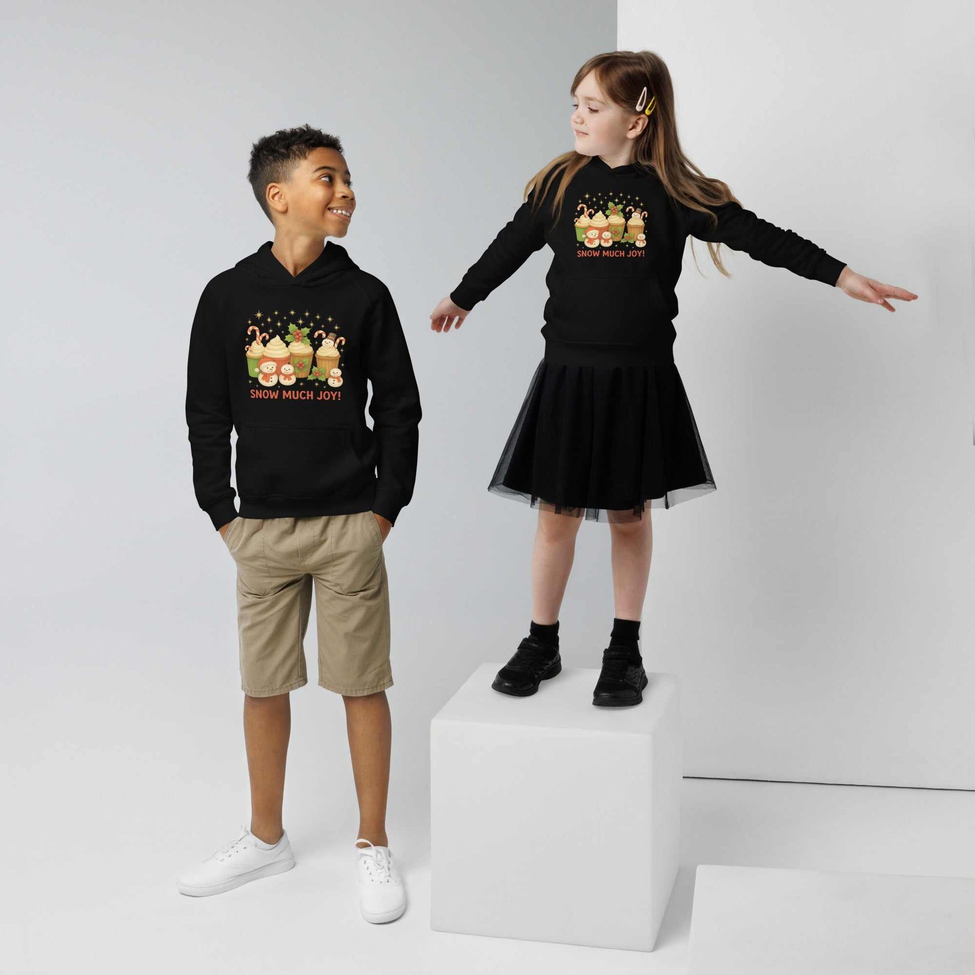Kids wearing black festive Kids Christmas Hoodie with holiday graphic design