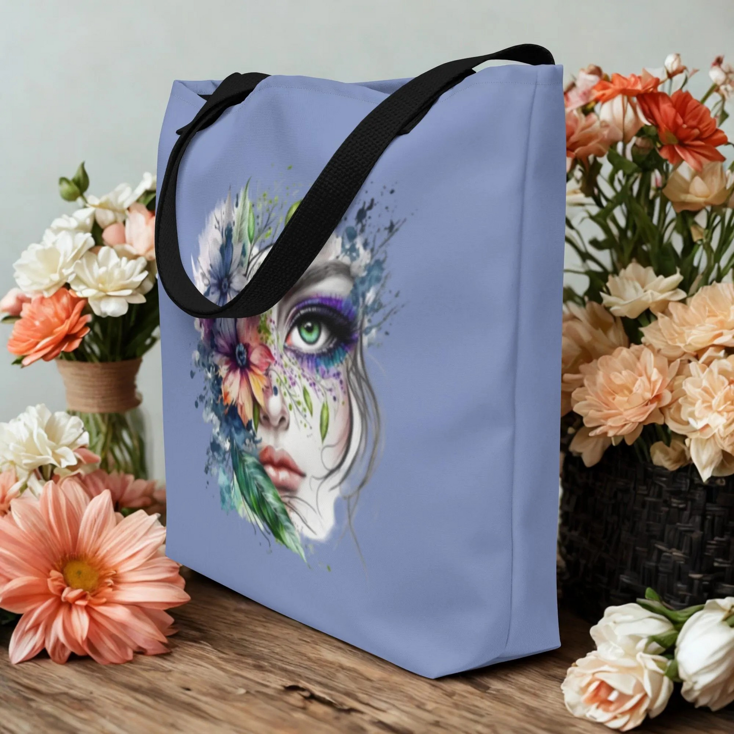 Large Floral Mystic Tote Bag with artistic face and floral print, durable with black handles, eco-friendly reusable bag