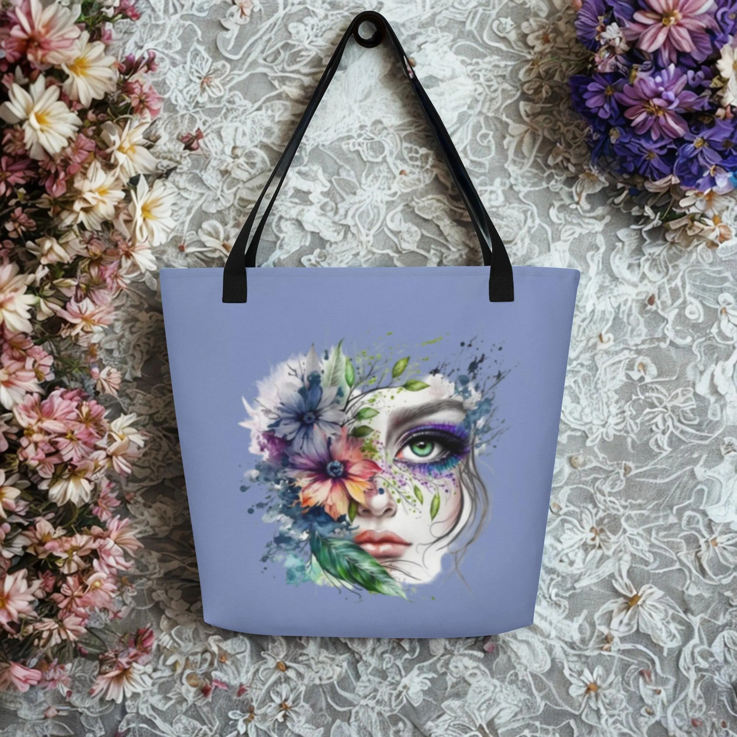 Large Floral Mystic Tote Bag with colorful artistic face and flower design, black handles, eco-friendly and spacious carryall.