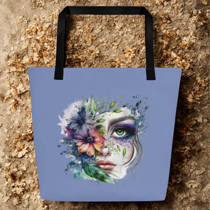 Large Floral Mystic Tote Bag with artistic floral face print and black handles on textured background