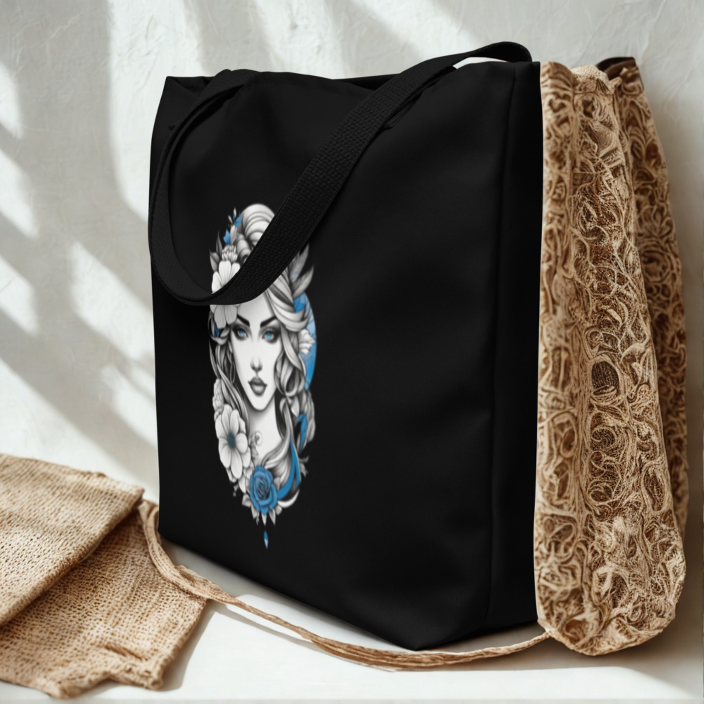 Mystic Blue Floral Goddess Large Tote Bag with black fabric and blue floral goddess design, sturdy handles