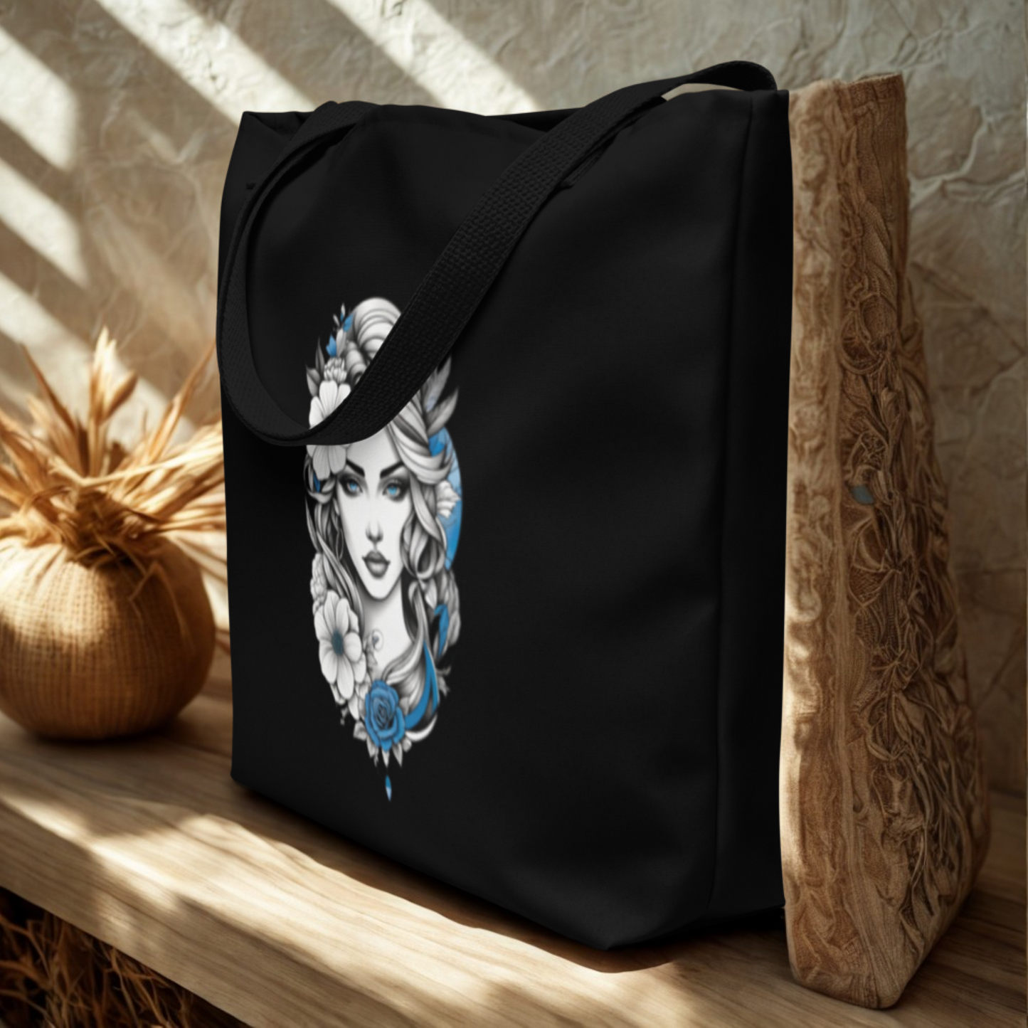 Mystic Blue Floral Goddess Large Tote Bag with floral goddess design, durable black polyester, comfortable handles, spacious interior, and vibrant blue accents.