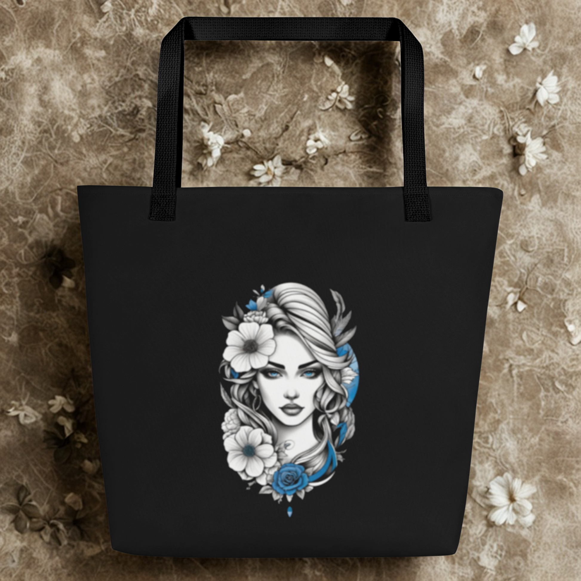 Mystic Blue Floral Goddess Large Tote Bag with black base and elegant white and blue floral goddess design, durable and spacious with comfortable handles.