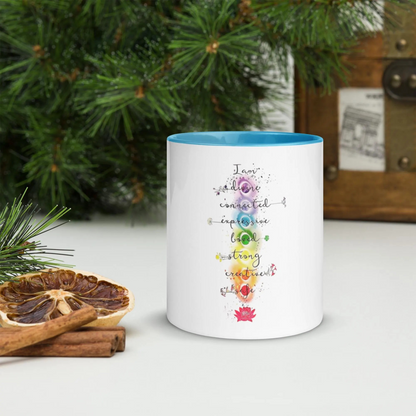 Motivation Chakra Mug with colorful chakra design and blue interior, ceramic, microwave and dishwasher safe.