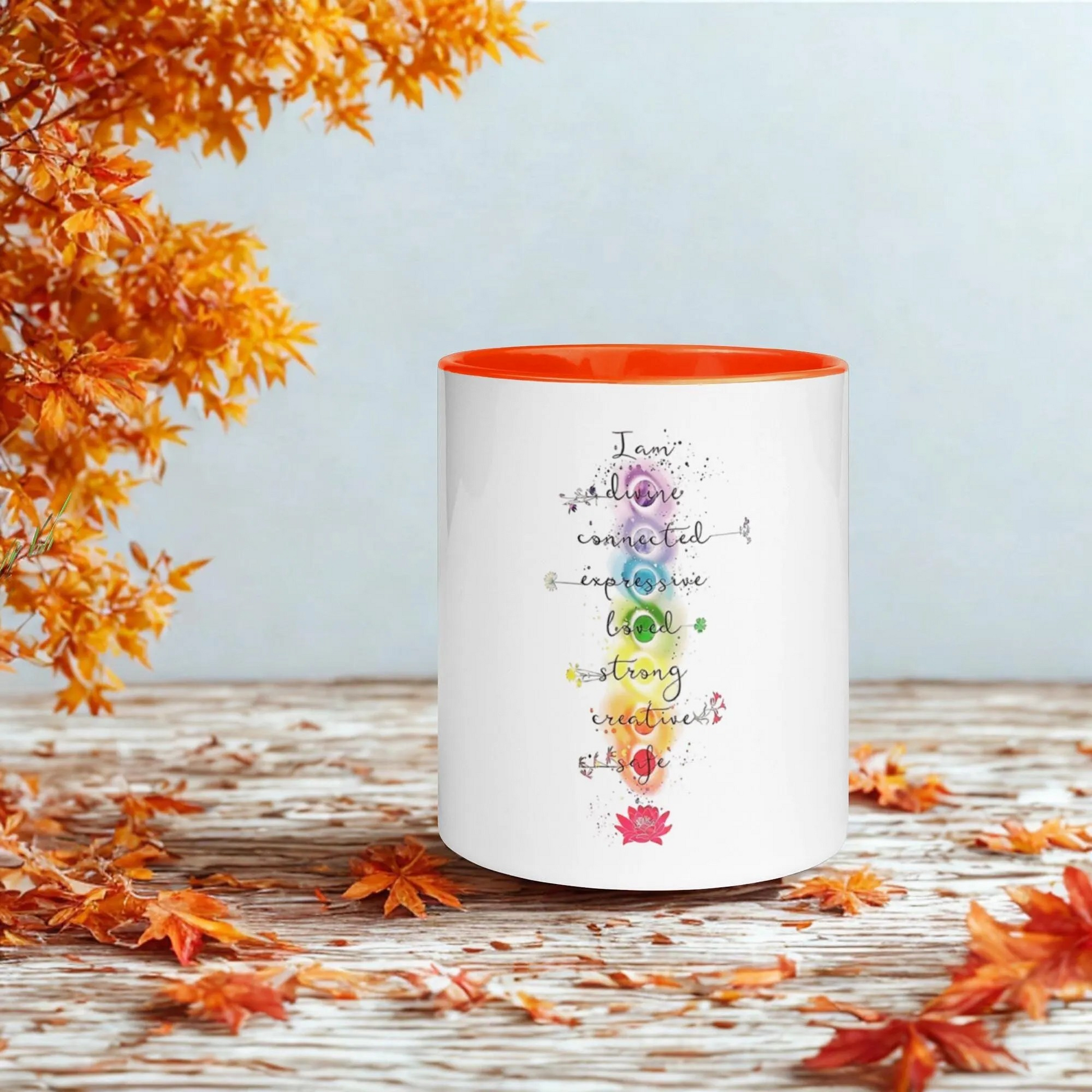 Motivation Chakra Mug with vibrant chakra design and orange interior, ceramic, dishwasher and microwave safe.
