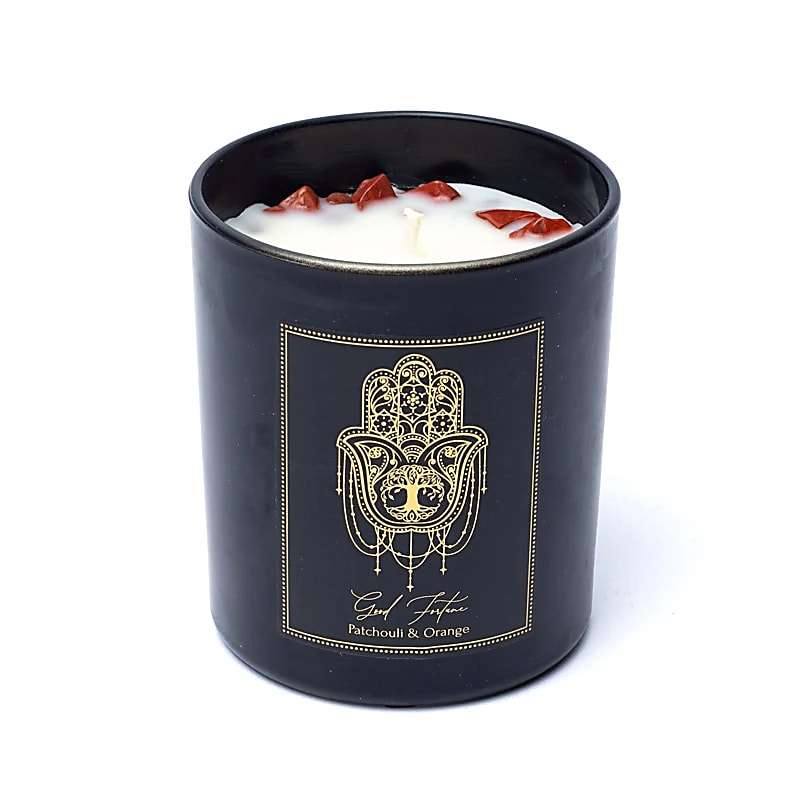 Good Fortune Manifestation Candle luxe kaars met patchouli, sinaasappel en rode jaspis edelstenen in zwarte houder voor geluk en voorspoed.