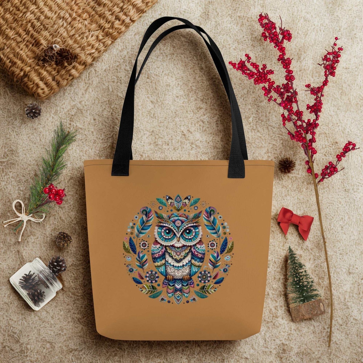 Mystical Owl Tote Bag with vibrant boho owl design and black handles on beige background