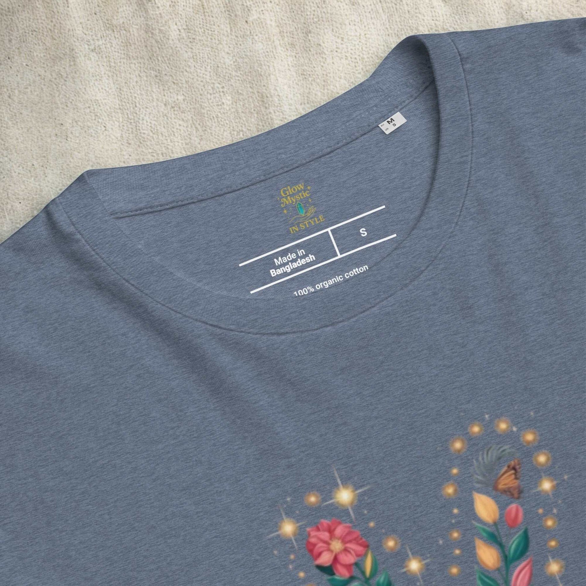 Unisex organic cotton T-shirt in blue with floral design and soft breathable fabric