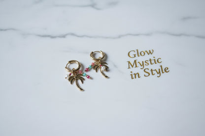 Oorbellen als mock up op een marmeren blad met de naam Glow Mystic in Style
