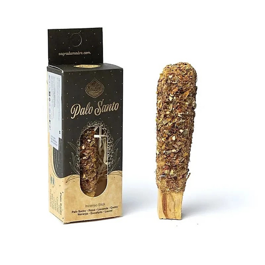 Sagrada Madre Palo Santo stokje omhuld met kruiden en bloemen naast de doos