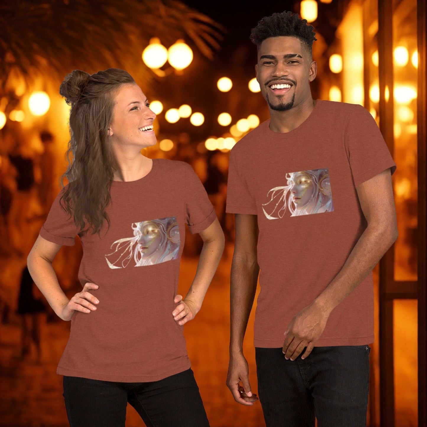 Couple wearing rust-colored Celestial Glow Goddess T-Shirt with cosmic artwork in warm nighttime setting